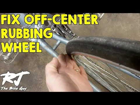 Basic bicycle repair tools laid out for fixing a rubbing tire.