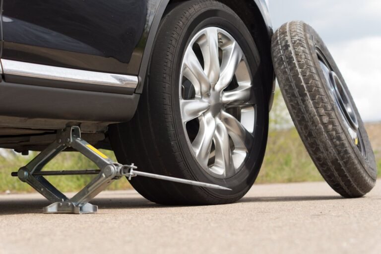 A sports car parked with its empty trunk showing weight reduction for better speed.